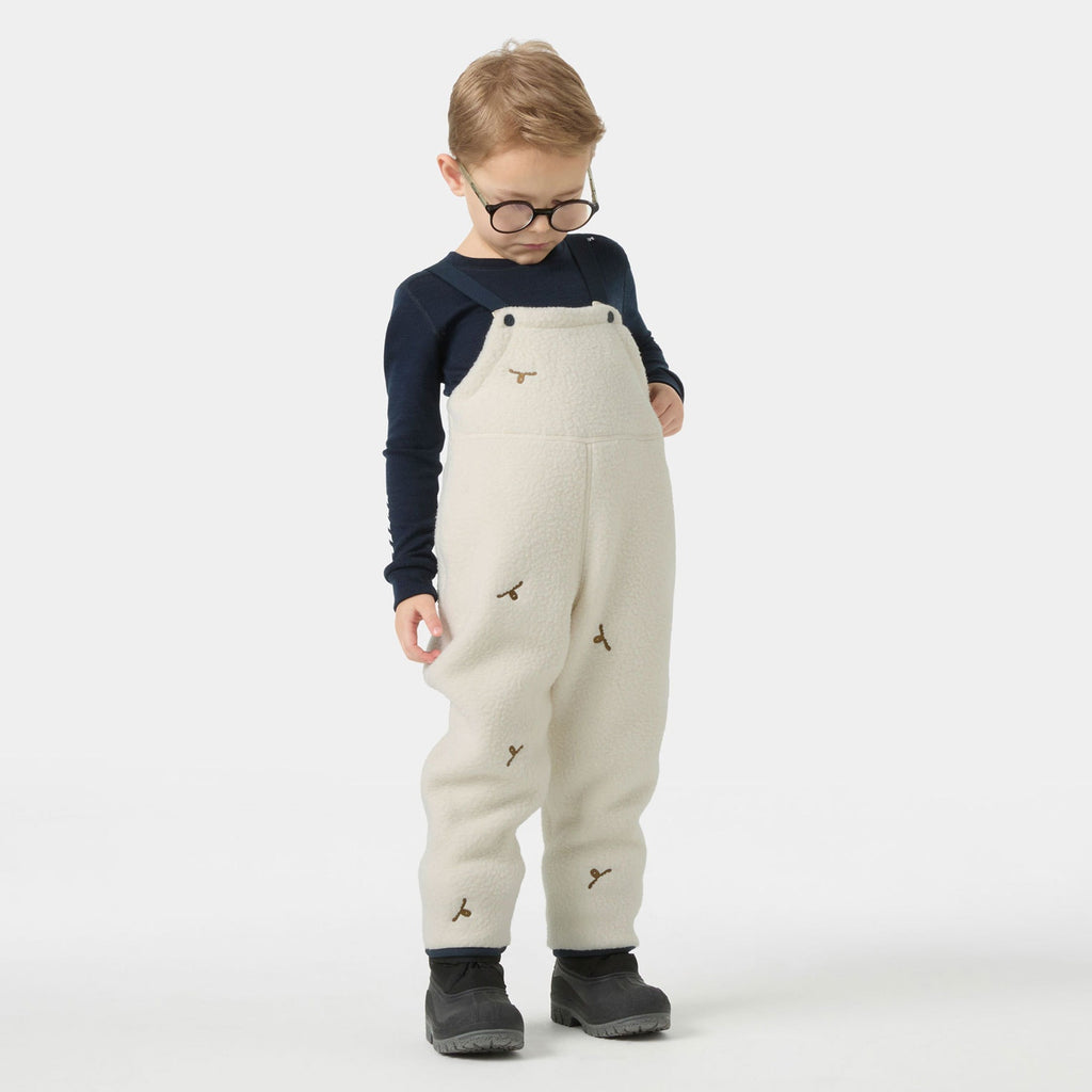 K FROSTY PILE BIB, CREAM EMB, 86/1